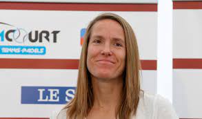 Justine Henin, a Belgian former professional tennis player known for her all-court style of play and notably being one of the few female players to use a single-handed backhand.